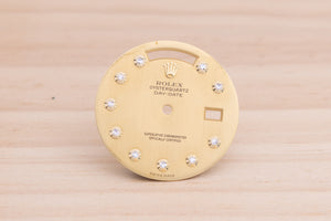 Rolex Day-Date Oysterquartz Champagne Linen Bezel Set Diamond Dial FCD27552